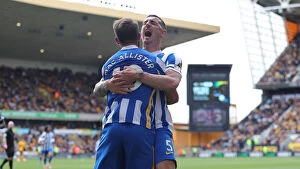 Brighton And Hove Albion Striker Alexis Mac Allister 10 Collection: Lewis Dunk's Defiant Lead: Brighton's Stalwart Performance vs. Wolverhampton Wanderers (30APR22)