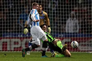 Huddersfield Town - 17-11-2012 Prints: Lewis Dunk's Determined Slide Tackle in Brighton & Hove Albion's Win Against Huddersfield Town