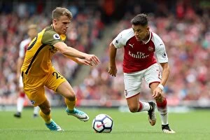 Images Dated 1st October 2017: March vs. Sanchez: Intense Midfield Battle at Emirates Stadium - Arsenal vs