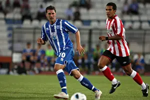 Sunderland (pre-season Friendly) Prints: Matt Sparrow passes the ball - shadowed by Kieron Richardson