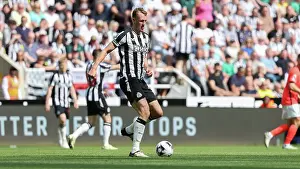 Newcastle United Defender Dan Burn 33 Prints: Newcastle United v Brighton and Hove Albion Premier League 11MAY24