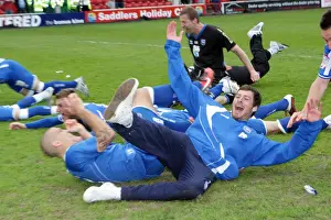 Walsall Prints: The players celebrate winning the League 1 title away at Walsall, April 2011