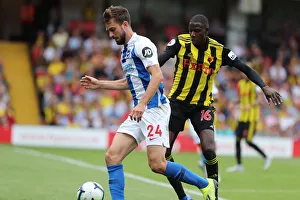 Watford Away 11AUG18 Prints: Propper and Doucoure Clash in Intense Watford vs. Brighton Premier League Match (11AUG18)