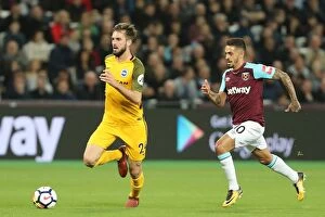 Images Dated 20th October 2017: Propper vs. Lanzini: Intense Midfield Battle in West Ham United vs