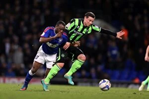 Images Dated 1st January 2013: Reo-Coker and Hoskins in Intense Possession Battle: Ipswich Town vs