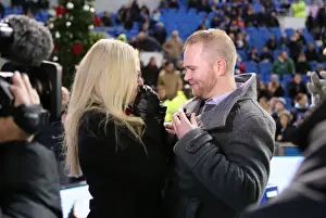 A Romantic Moment at the Football Field: Jamie Howell Proposes to Kristina Sinclair during Brighton and Hove Albion vs. Millwall (12DEC14)