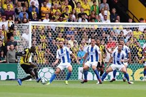 Watford Away 11AUG18 Collection: Three Seasiders Guarding the Goal: Propper, Dunk, and Duffy Block Doucoure's Cross