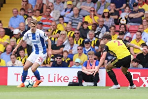Images Dated 11th August 2018: Solly March vs. Daryl Janmaat: Intense Midfield Battle at Vicarage Road - Watford vs