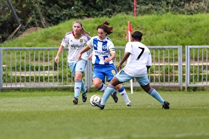 Thrilling Showdown: Brighton & Hove Albion vs. West Ham United (Women's Football, 2013-14 Season)