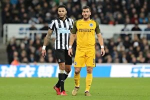 Images Dated 30th December 2017: Tomer Hemed vs Jamaal Lascelles: Intense Battle in Newcastle United vs Brighton