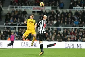 Images Dated 30th December 2017: Tomer Hemed vs. Jonjo Shelvey: Intense Battle in Newcastle United vs