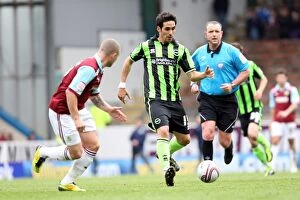 Images Dated 6th April 2012: Vicente's Unyielding Determination: A Moment of Brighton & Hove Albion Glory at Turf Moor