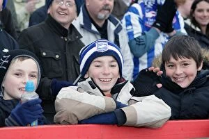 Images Dated 3rd January 2011: Young fans at Exeter City, January 2011